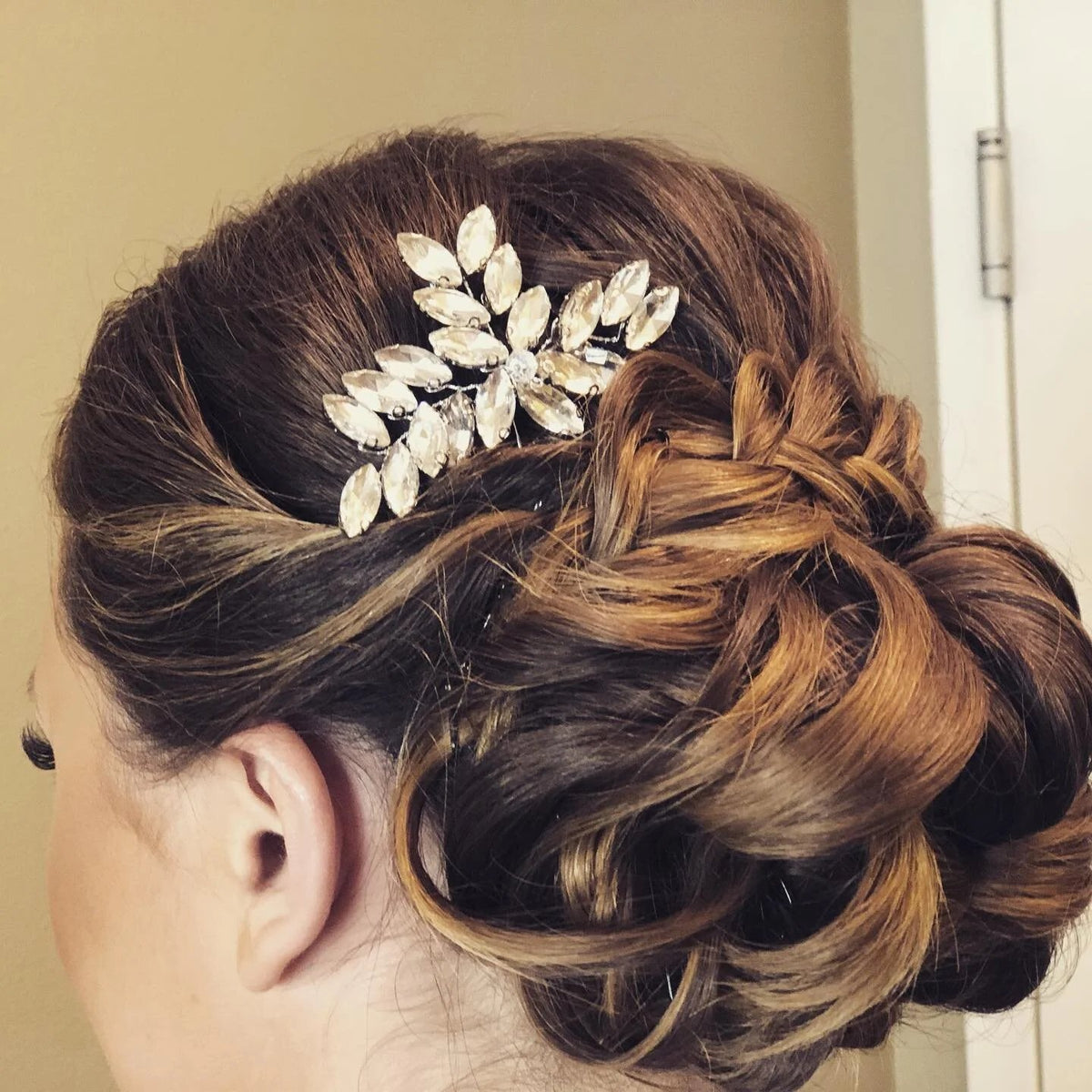 Bridal updo with a crystal hair comb at SALT Salon + Spa, Antioch IL